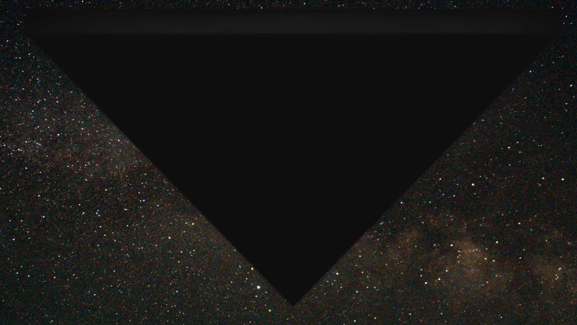 FBI-UAP-D025 — the FBI's digital rendering of a reported June 2002 incident over Bagram Air Force Base, Afghanistan: an enormous solid-black triangle seen from directly below, its edges cutting across a dense field of stars. Prepared by the Bureau in 2026 from a former military pilot's first-hand description and released by the Department of War in PURSUE Release 05.